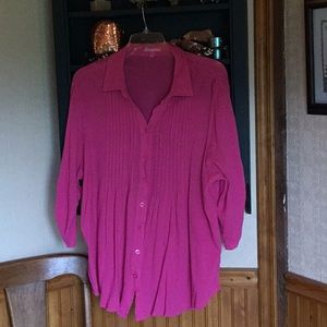 Woman within gauze pleated blouse tunic